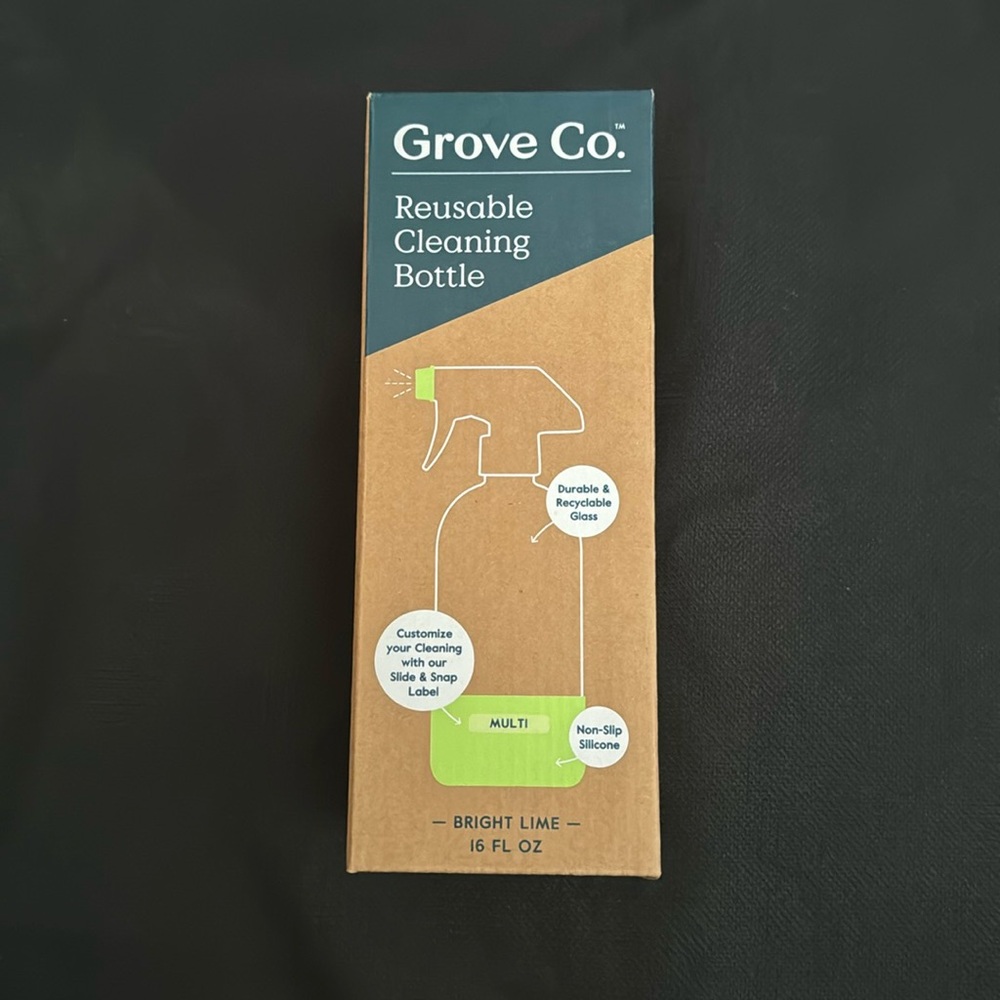 One new glass Grove Co. R reusable cleaning Bottle